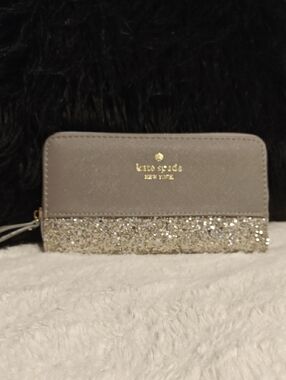 NWOT Kate Spade gray wallet with gold glitter bottom